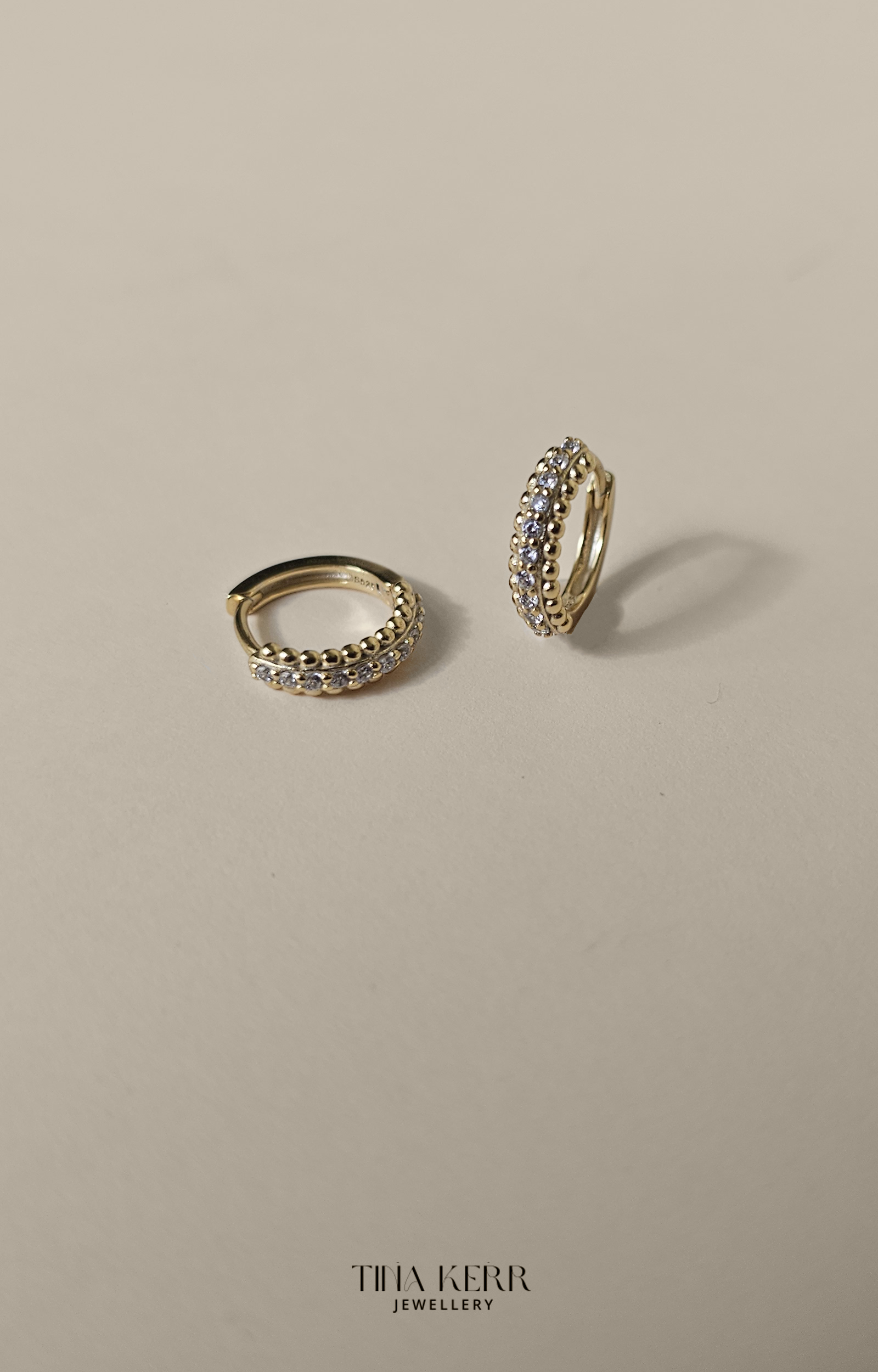 Daisie Huggie Hoop Earrings